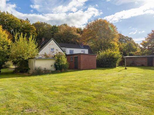 Mehrfamilienhaus zum Kauf 449.000 € 10 Zimmer 200 m² 2.313 m² Grundstück frei ab sofort Kölln-Reisiek 25337