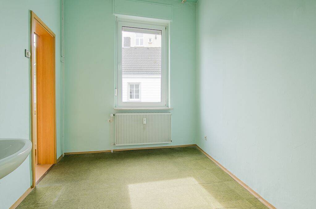 Immobilie in Unna - Attraktives Wohn- und Geschäftshaus mit Garage und Stellplatz als Anlageoption - Bild 2