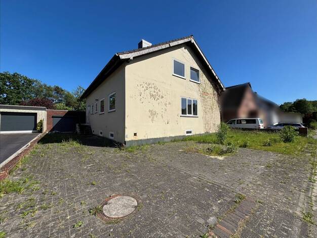 Mehrfamilienhaus zum Kauf 199.000 € 7 Zimmer 172 m² 979 m² Grundstück Hambergen Hambergen 27729