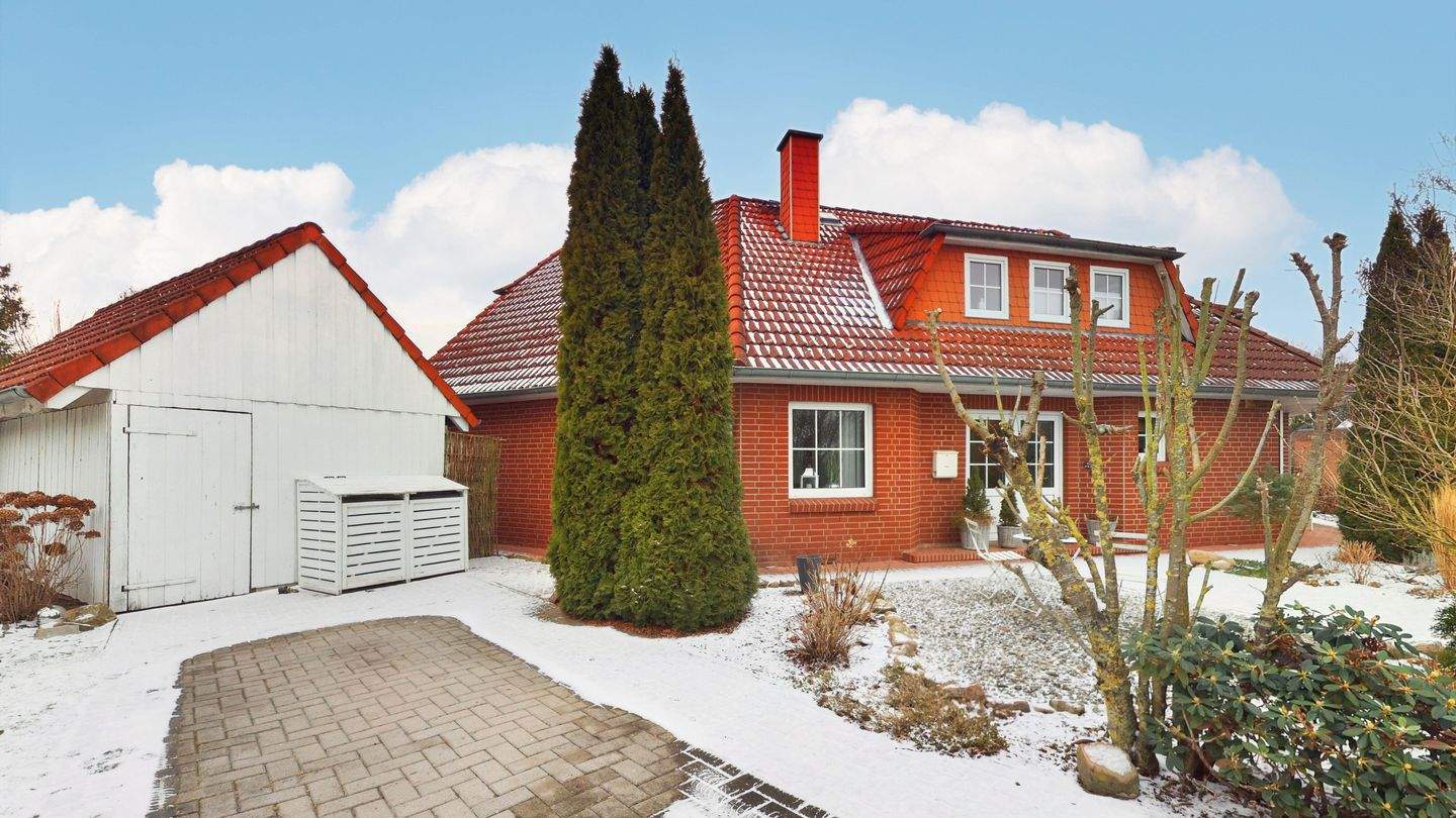 Immobilie in Landesbergen - Doppelhaushälfte mit großzügigem Wohngefühl und liebevoll angelegtem Garten - Bild 1