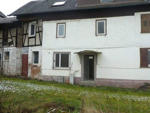 Einfamilienhaus zum Kauf 210.000 € 4 Zimmer 124 m² 580 m² Grundstück Nieder-Weisel Butzbach 35510