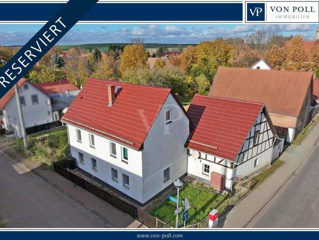 Einfamilienhaus zum Kauf 175.000 € 8 Zimmer 160 m² 354 m² Grundstück Niederzimmern 99428