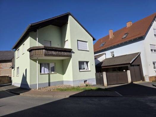 Einfamilienhaus zum Kauf 185.000 € 5 Zimmer 119,5 m² 707 m² Grundstück Kützberg Poppenhausen 97490