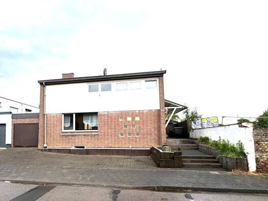 Einfamilienhaus zum Kauf 245.000 € 6 Zimmer 167 m² 394 m² Grundstück Höllen Titz 52445