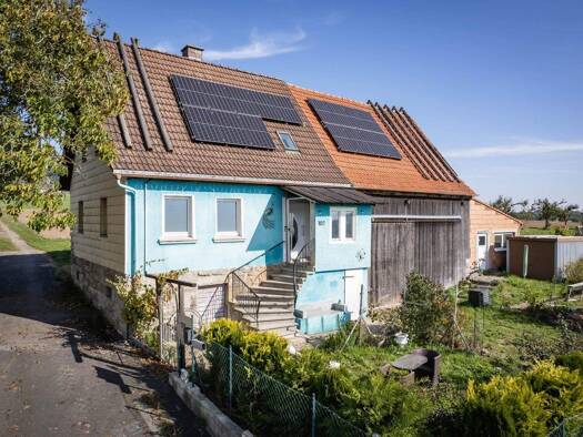 Einfamilienhaus zum Kauf 147.000 € 3 Zimmer 87 m² 1.480 m² Grundstück Platz Geroda 97779