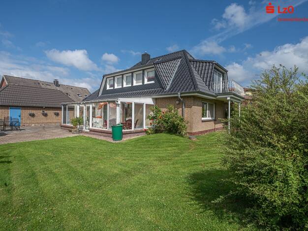 Mehrfamilienhaus zum Kauf 415.000 € 7 Zimmer 176,8 m² 829 m² Grundstück Hooksiel Wangerland 26434