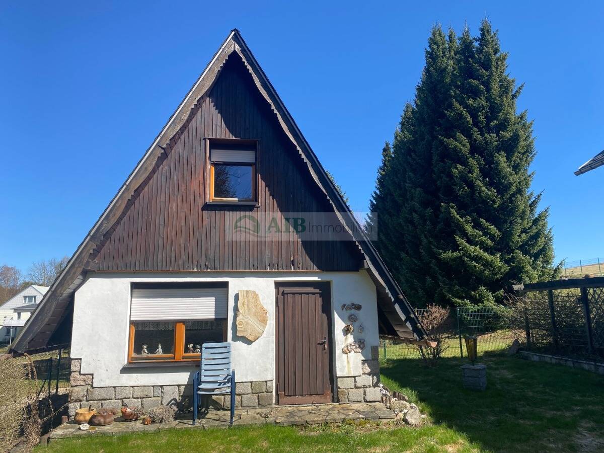 Immobilie in Marienberg - Bezugsfertiges Wohnhaus mit Garage, Finnhütte, Naturschieferdächer, Kamin, ausgebauter Vollkeller... - Bild 2