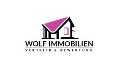 WOLF IMMOBILIEN logo