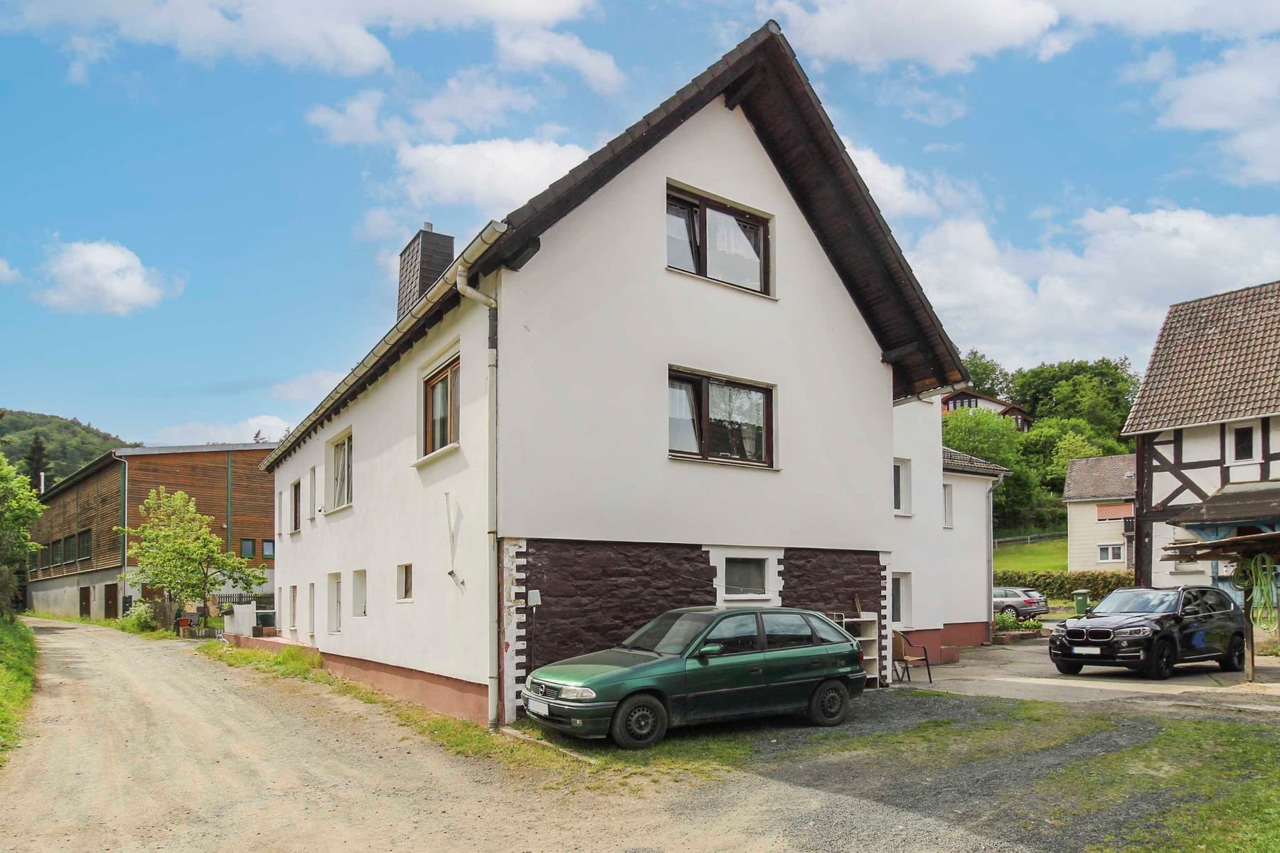 Mehrfamilienhaus zum Kauf 429.000 € 15 Zimmer 282,3 m²<br/>Wohnfläche 1.218,3 m²<br/>Grundstück Hommertshausen Dautphetal 35232