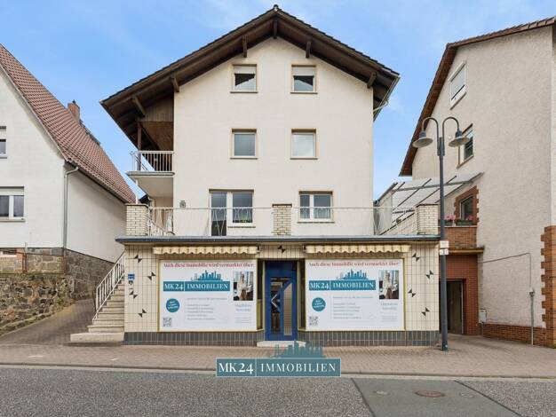 Mehrfamilienhaus zum Kauf provisionsfrei als Kapitalanlage geeignet 419.000 € 8 Zimmer 213 m² 456 m² Grundstück Hauptstraße 13 Treis Staufenberg 35460