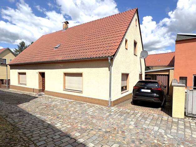 Einfamilienhaus zum Kauf 170.000 € 5 Zimmer 117,4 m² 482 m² Grundstück frei ab sofort Ortrand 01990
