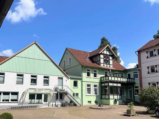 Wohn- und Geschäftshaus zum Kauf als Kapitalanlage geeignet 990.000 € 39 Zimmer 2.409 m² 11.747 m² Grundstück Buchholz in der Nordheide 31710