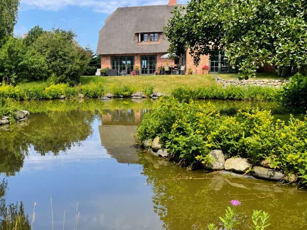 Einfamilienhaus zum Kauf 5 Zimmer 450 m² 4.500 m² Grundstück Morsum Sylt 25980