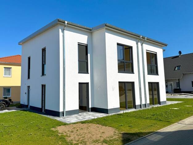 Doppelhaushälfte zum Kauf - Erstbezug 435.000 € 4 Zimmer 106 m² 250 m² Grundstück Muschenheim Lich 35423