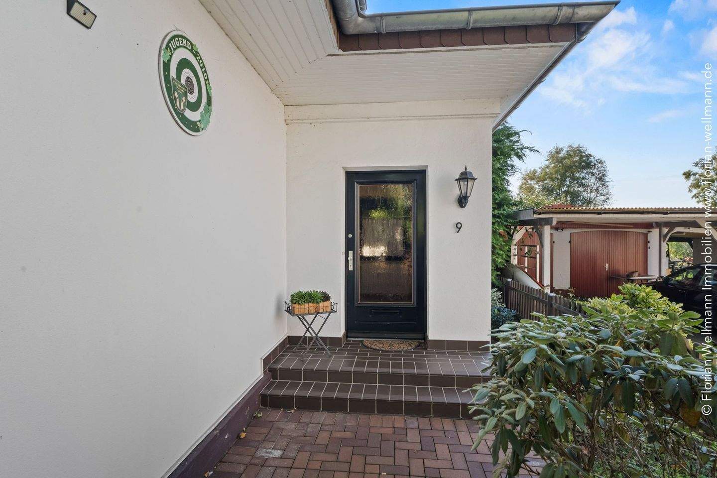 Immobilie in Oyten - Oyten - Bassen | Gepflegtes Einfamilienhaus mit viel Platz, zwei Terrassen, großem Garten und Doppelgarage in idyllischer Ortsrandlage - Bild 1