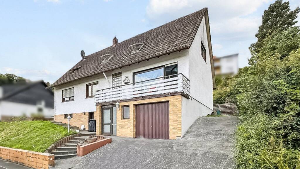 Einfamilienhaus zum Kauf 380.000 € 7 Zimmer 172 m² 655 m² Grundstück Fronhausen 35112
