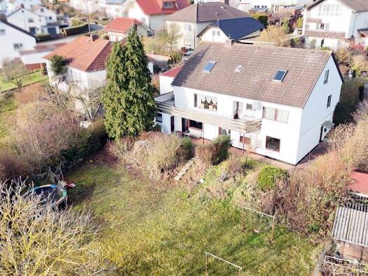 Einfamilienhaus zum Kauf 239.000 € 9 Zimmer 230 m² 1.257 m² Grundstück Kastanienweg 4 Wolfhagen 34466