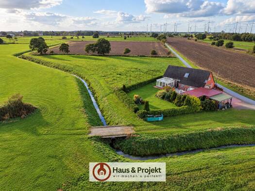 Einfamilienhaus zum Kauf 259.000 € 5 Zimmer 155 m² 6.077 m² Grundstück Schweindorf 26556
