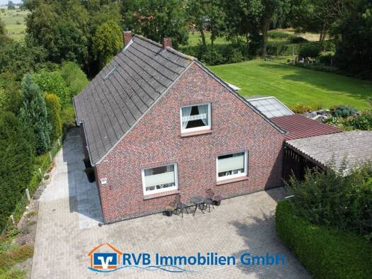 Einfamilienhaus zum Kauf 190.000 € 4 Zimmer 138,8 m² 1.536 m² Grundstück Buttforde Wittmund 26409
