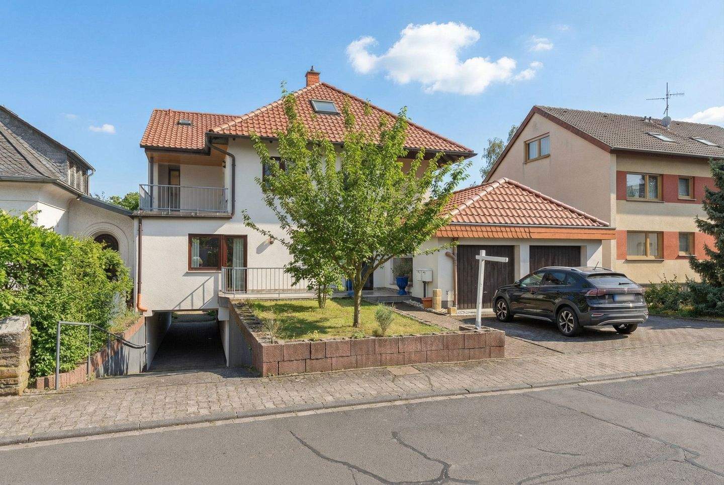 Immobilie in Unkel - Engel & Völkers: Modernisierte Souterrainwohnung in Unkel-Scheuren - Bild 2