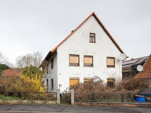Einfamilienhaus zum Kauf 99.000 € 5 Zimmer 180 m² 1.130 m² Grundstück frei ab sofort Hundsfelder Straße Obereschenbach Hammelburg 97762