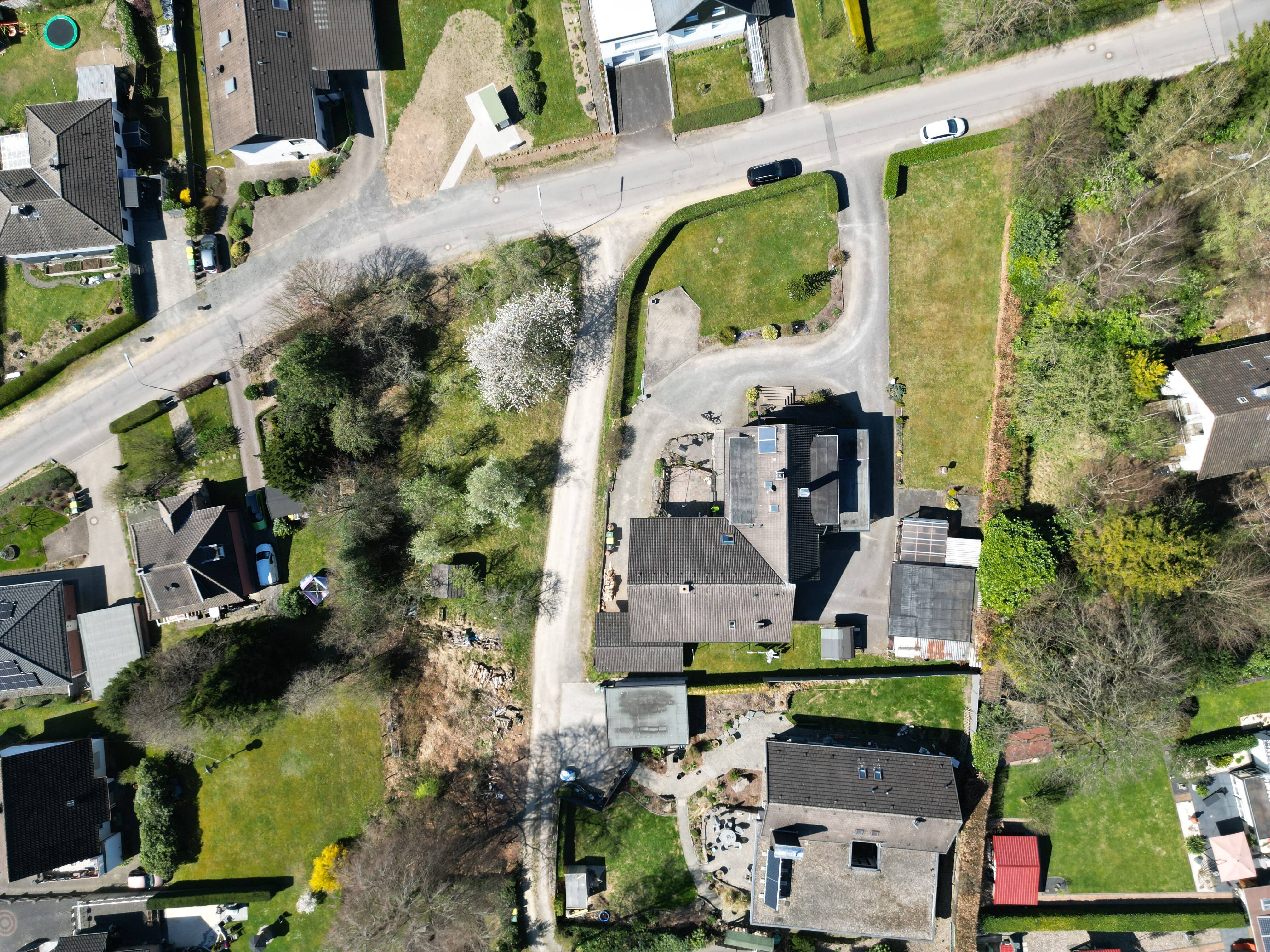 Immobilie in Reichshof - Charmantes Einfamilienhaus als Alternative zur Eigentumswohnung – mit Garten, Doppelgarage und großem Carport - Bild 4