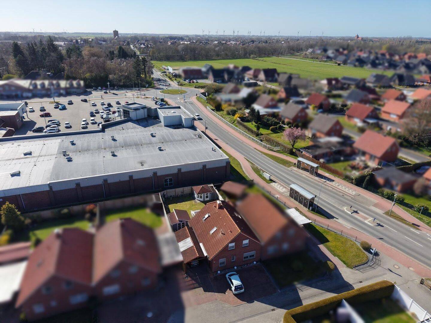 Immobilie in Upgant-Schott - IHR NEUES ZUHAUSE: VIELSEITIGE HAUSHÄLFTE MIT WINTERGARTEN, TERRASSE UND CARPORT - Bild 4
