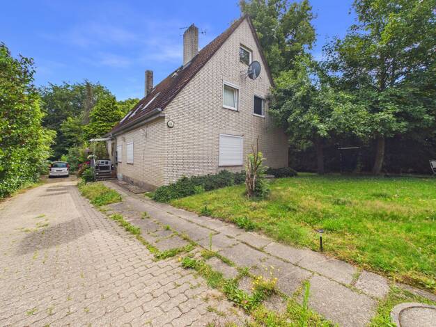 Mehrfamilienhaus zum Kauf 310.000 € 7 Zimmer 161 m² 1.000 m² Grundstück Tralau Travenbrück 23843