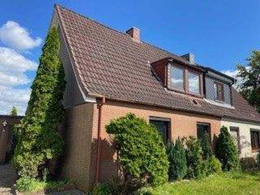 Einfamilienhaus zum Kauf 178.000 € 5 Zimmer 120 m² 617 m² Grundstück frei ab sofort Hasselkamp 4 Tungendorf Neumünster 24536