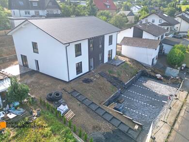 Reihenendhaus zum Kauf - Erstbezug 349.000 € 4 Zimmer 105 m² 876 m² Grundstück Wissen 57537