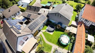 Einfamilienhaus zum Kauf 419.500 € 7,5 Zimmer 200 m² 516 m² Grundstück Holzweiler Grafschaft 53501