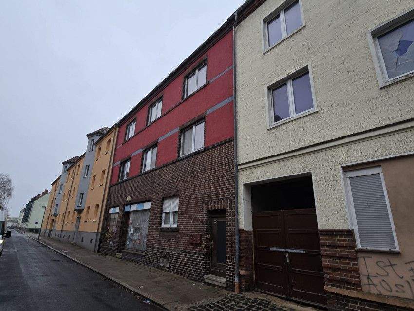 Immobilie in Bitterfeld-Wolfen - Mehrfamilienhaus mit 3 Wohneinheiten - Bild 1
