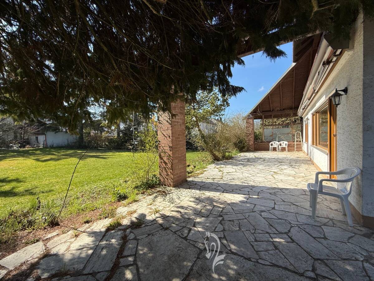 Immobilie in Unterpleichfeld - Architektenhaus mit großzügiger Einliegerwohnung und großem Garten in attraktiver Wohnlage - Bild 3