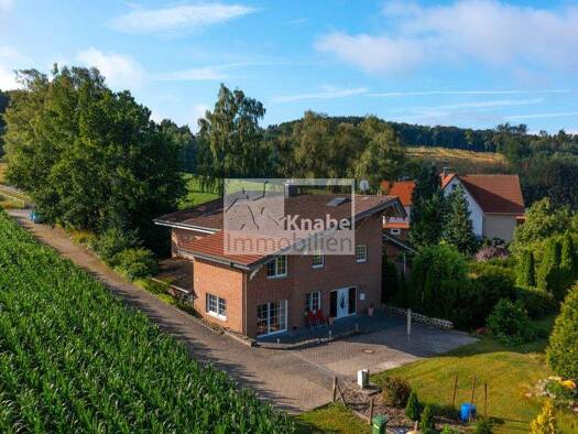 Doppelhaushälfte zum Kauf 235.000 € 3 Zimmer 105 m² Hankenberge Hilter 49176