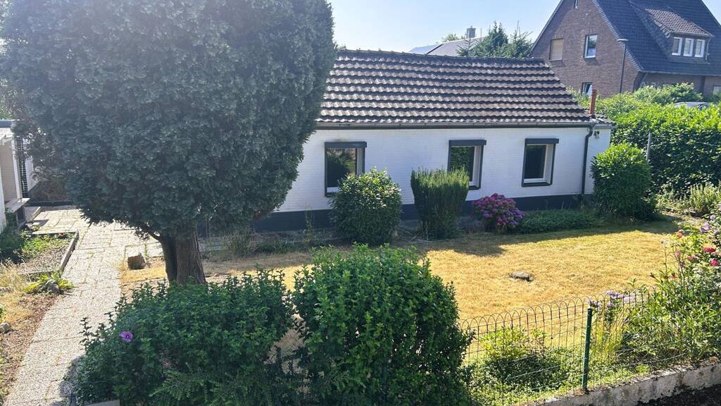 Einfamilienhaus zum Kauf 290.000 € 3 Zimmer 90 m² 450 m² Grundstück Lank-Latum Meerbusch 40668