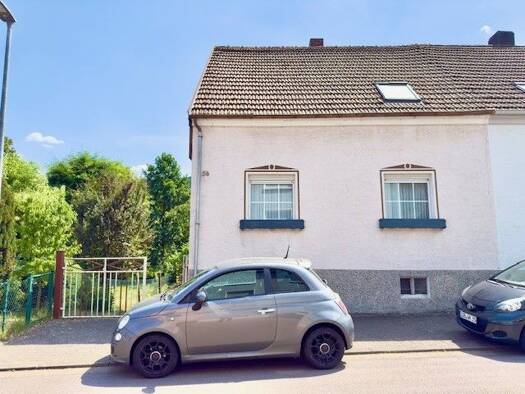 Doppelhaushälfte zum Kauf 225.000 € 6 Zimmer 139 m² 468 m² Grundstück frei ab sofort Friedhofstraße Oberwürzbach Sankt Ingbert 66386