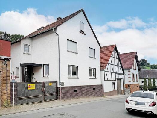 Mehrfamilienhaus zum Kauf 219.000 € 8 Zimmer 180 m² 730 m² Grundstück Lützel-Wiebelsbach Lützelbach 64750