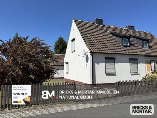 Doppelhaushälfte zum Kauf 97.000 € 3 Zimmer 91 m² 644 m² Grundstück Wolfen 06766