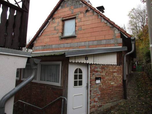 Einfamilienhaus zum Kauf 60.000 € 4 Zimmer 52 m² 130 m² Grundstück Kranichfeld 99448