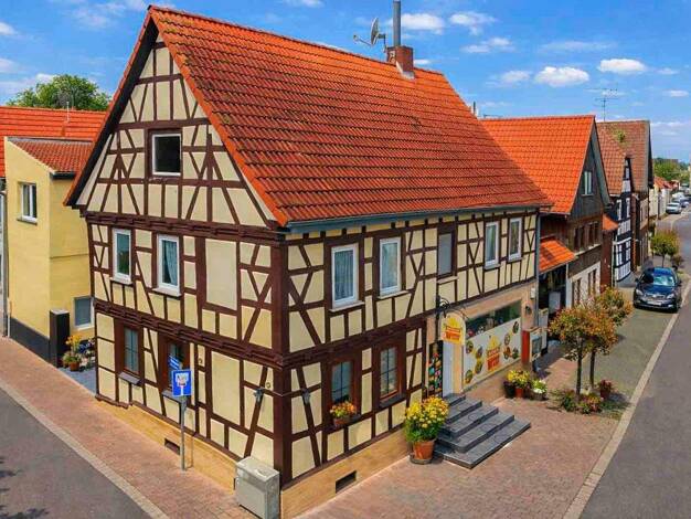 Mehrfamilienhaus zum Kauf als Kapitalanlage geeignet 399.000 € 9 Zimmer 280,7 m² 175,1 m² Grundstück Groß-Zimmern 64846