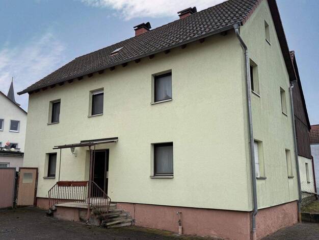 Mehrfamilienhaus zum Kauf 129.000 € 4 Zimmer 130 m² 1.043 m² Grundstück Raiffeisenstraße 11 Nüdlingen 97720