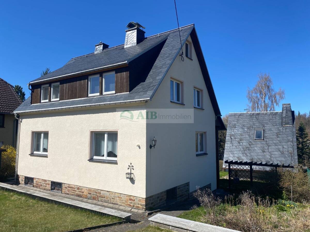 Immobilie in Marienberg - Bezugsfertiges Wohnhaus mit Garage, Finnhütte, Naturschieferdächer, Kamin, ausgebauter Vollkeller... - Bild 1