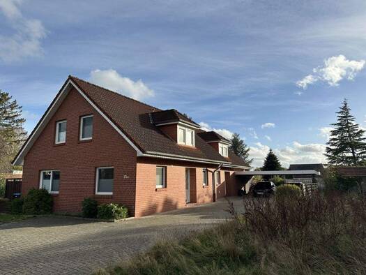 Mehrfamilienhaus zum Kauf 360.000 € 10 Zimmer 222 m² 672 m² Grundstück Holterfehn Ostrhauderfehn 26842