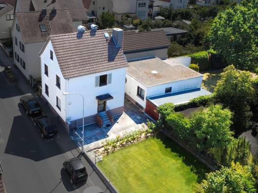 Einfamilienhaus zum Kauf 742.000 € 8 Zimmer 189 m² 834 m² Grundstück Langen Langen 63225