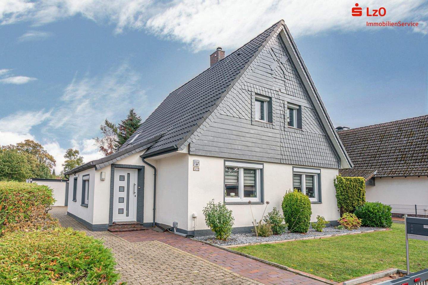 Chamantes Einfamilienhaus auf liebevoll angelegtem Grundstück