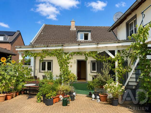 Mehrfamilienhaus zum Kauf 399.000 € 6 Zimmer 144 m² 1.291 m² Grundstück Noithausen Grevenbroich 41515