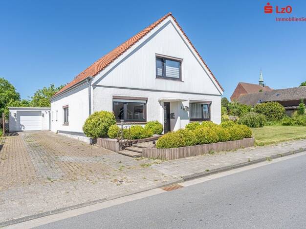 Einfamilienhaus zum Kauf 289.000 € 6 Zimmer 171,3 m² 1.217 m² Grundstück Wiarden Wangerland 26434