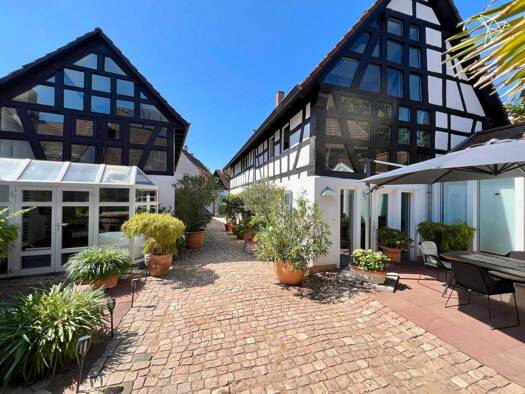 Einfamilienhaus zum Kauf 1.399.000 € 7 Zimmer 320 m² 617 m² Grundstück Nauheim 64569