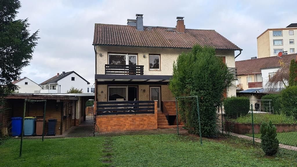 Doppelhaushälfte zum Kauf 379.000 € 6 Zimmer 115 m²<br/>Wohnfläche 499 m²<br/>Grundstück ab sofort<br/>Verfügbarkeit Bruchköbel Bruchköbel 63486