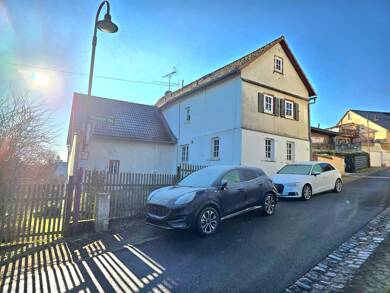 Einfamilienhaus zum Kauf 235.000 € 4,5 Zimmer 118 m² 579 m² Grundstück Hausen-Oes Butzbach 35510